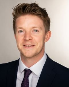 Daniel Degg, head of employer engagement & business development, wearing a white shirt and dark jacket an tie