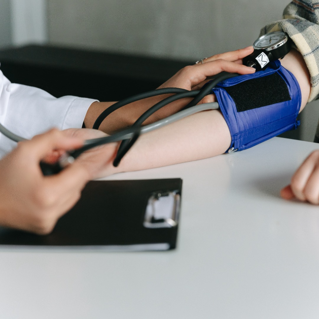 Blood pressure cuff on patient's arm