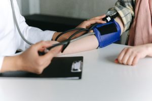 Blood pressure cuff on someone's arm