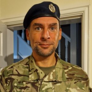 Former GCSE maths student Robin Tinsley wearing camouflage gear and an RAF beret