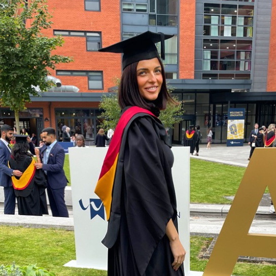 Picture of Lisha Simmonds in her graduation robes.