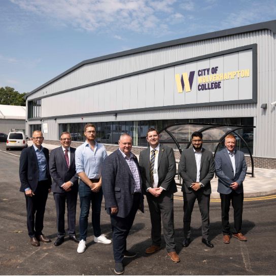 City partners standing outside the new centre